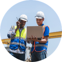 Construction workers completing digital safety training with Comevo